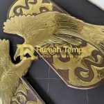pengrajin relief kuningan