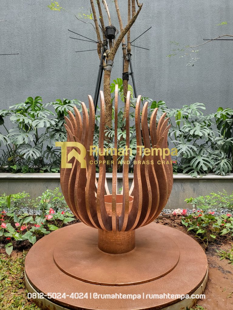 pengrajin monumen tembaga